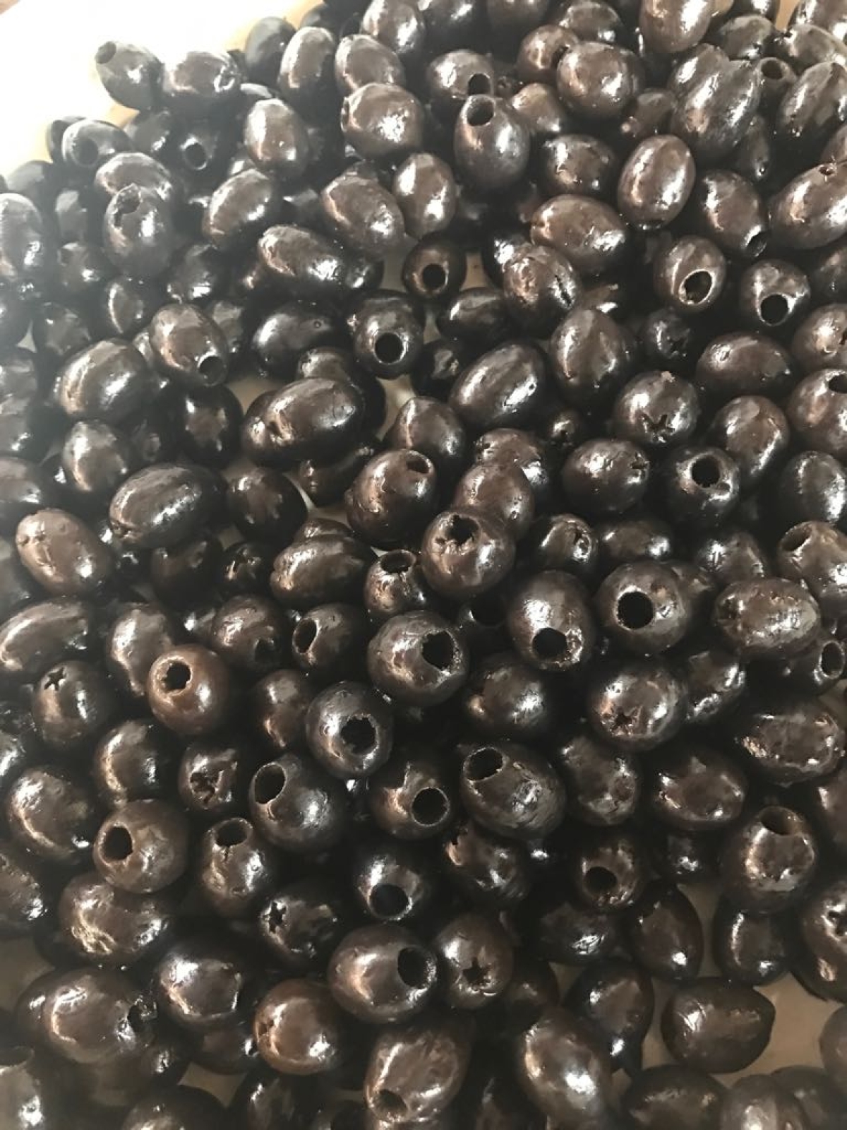 Pitted oxidized black olives