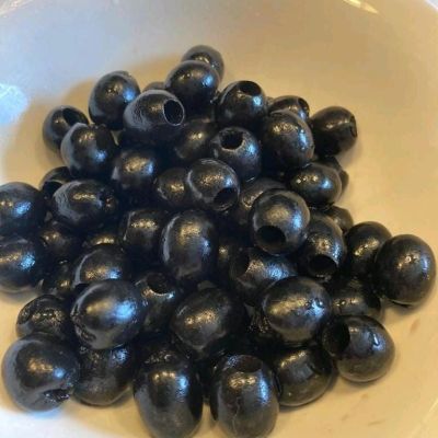 Pitted oxidized black olives